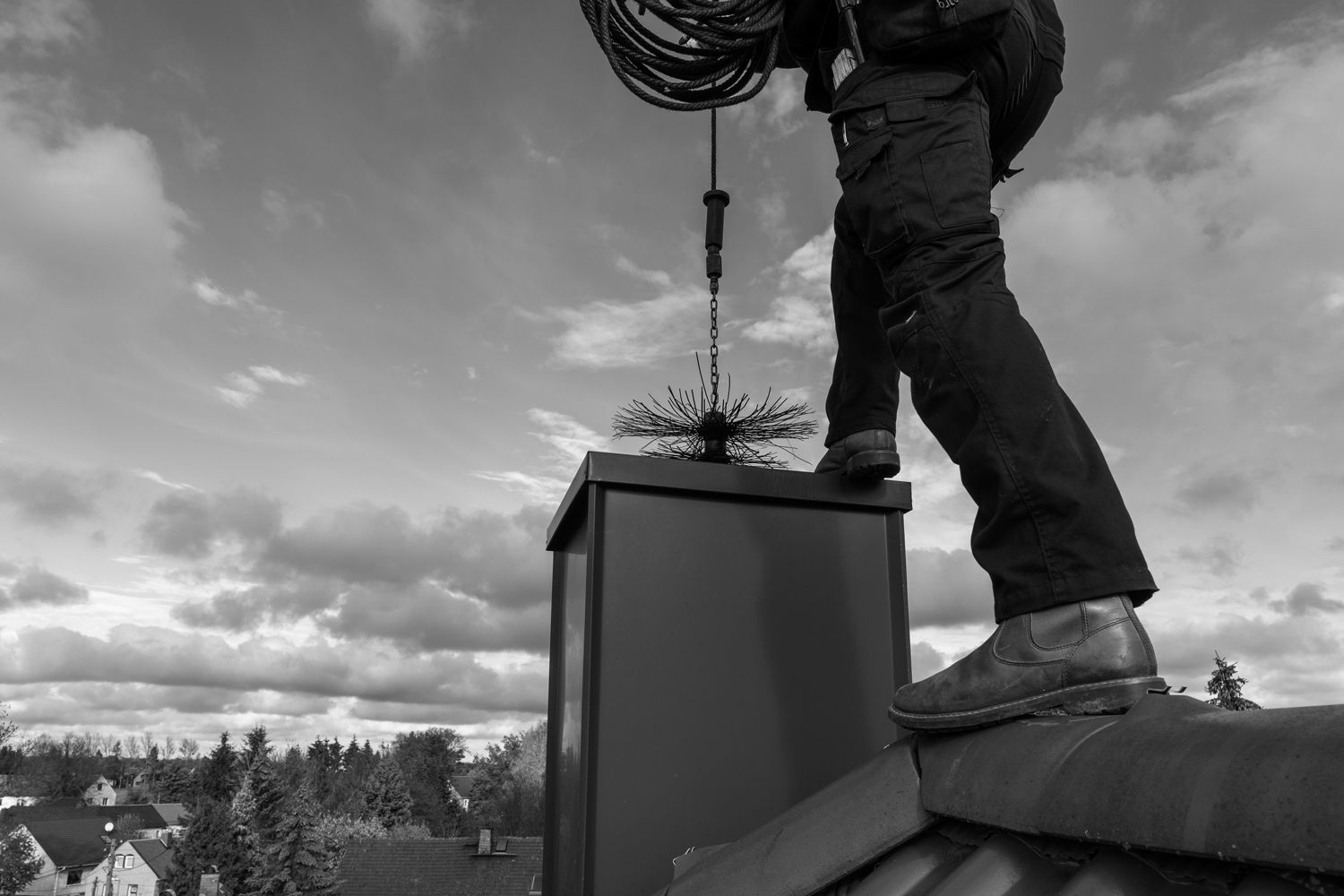 man sweeping Birmingham chimney